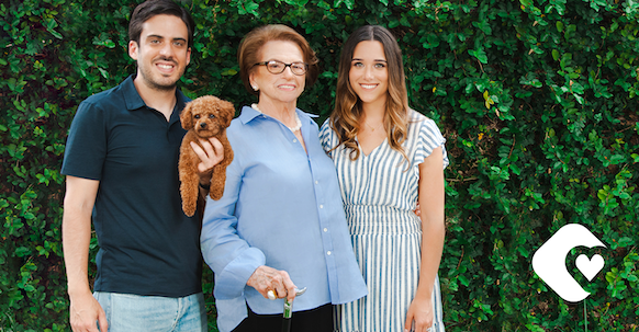 CEO Bianca and COO Jonathan pictured standing with grandmother and family dog.